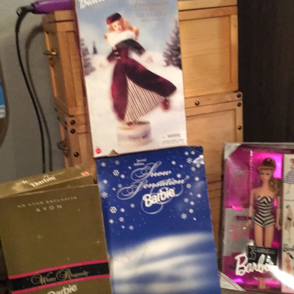 4 never opened limited editions Barbies packages are still great